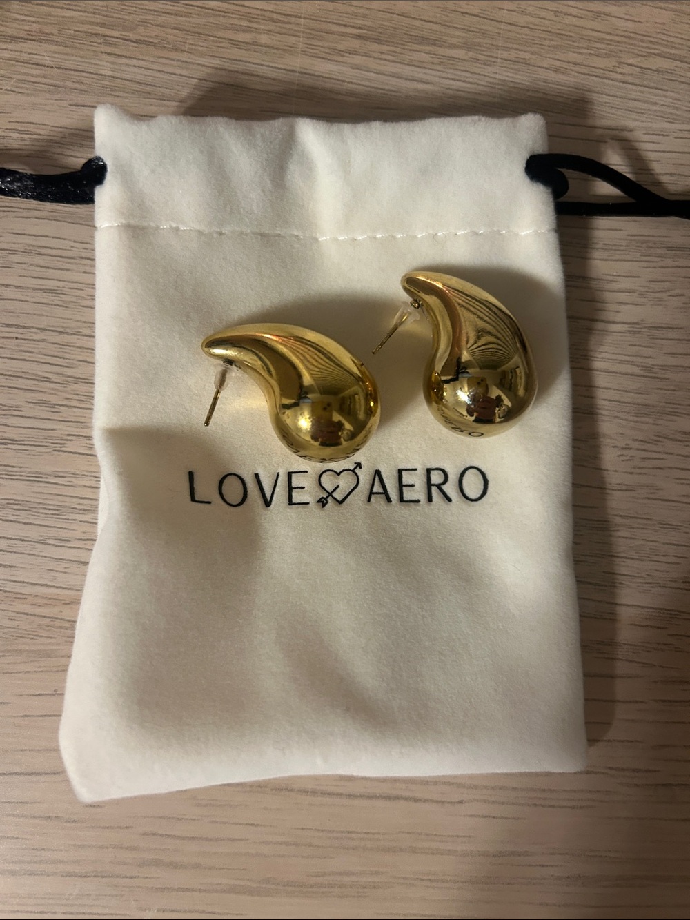 Love Aero Gold Teardrop Statement Earrings